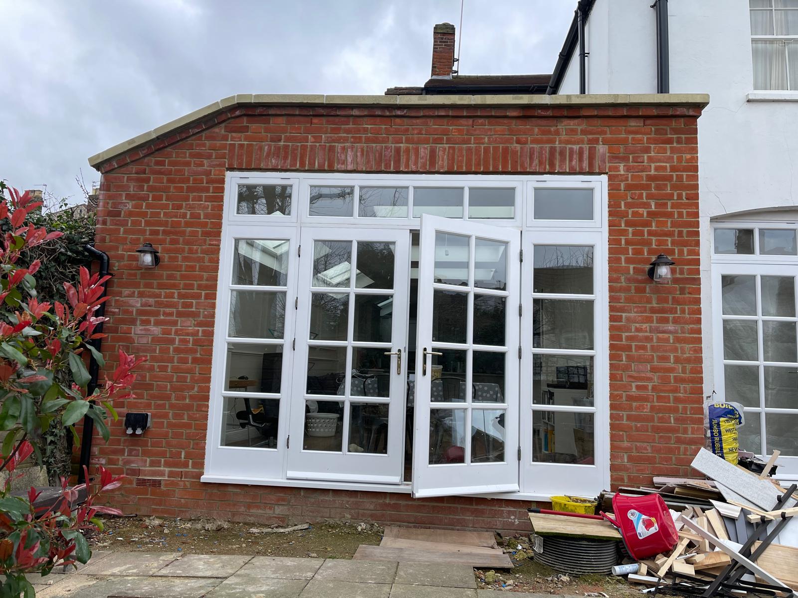 Rear extension exterior with new brickwork and french doors