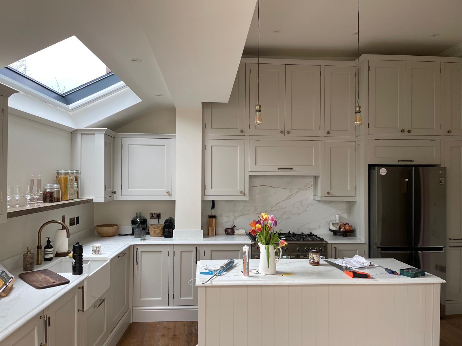 Open-plan kitchen extension with shaker units and roof lantern