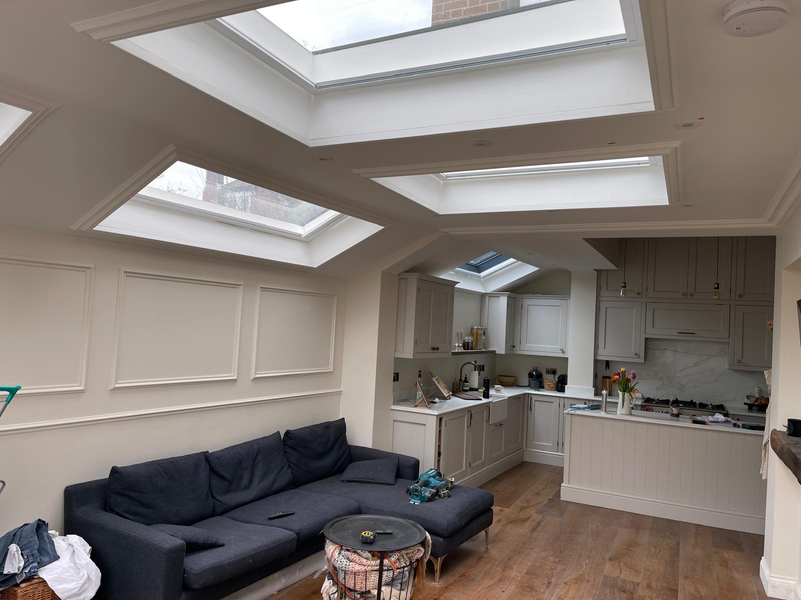 Side return extension with multiple skylights and open-plan living