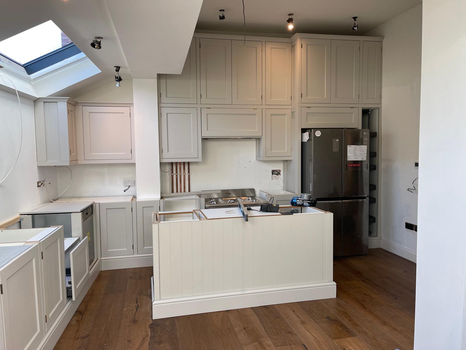 Kitchen extension in progress with new units and skylight